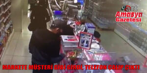 Markete müşteri gibi girdi, telefon çalıp çıktı